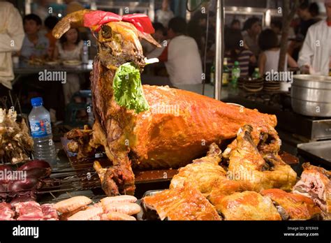 Roasted lamb at the night market in Urumqi in Xinjiang province in ...