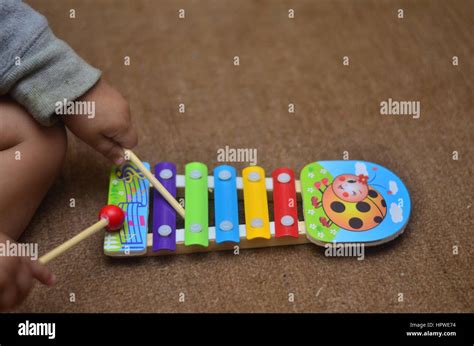 A Baby playing Xylophone Stock Photo - Alamy