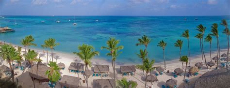 Aerial view of Holiday Inn Aruba beach. | Mexico vacation, Dream vacation spots, Vacation trips