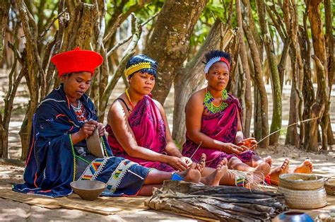 Zulu women weaving and doing traditional arts and crafts. Click on pic ...