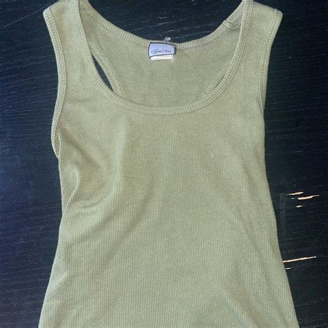 Plain green tank top. Worn once. Super pretty color... - Depop