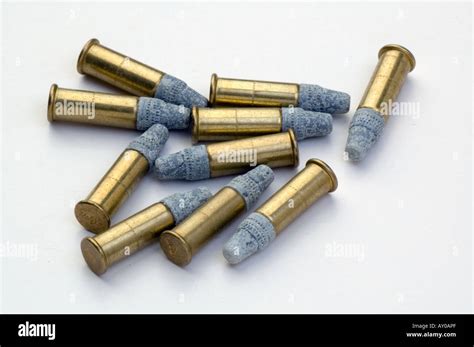 Corroded lead bullets 22 calibre on a white background Stock Photo - Alamy