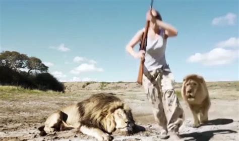 Footage of lion taking revenge by mauling big-game hunters is hoax ...