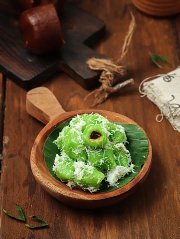 Klepon Or Pandan Klepon Filled With Liquid Brown Sugar Stock Photo - Download Image Now - iStock