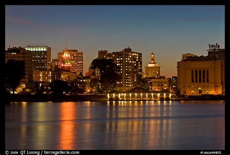 Picture/Photo: Oakland skyline reflected in Lake Merritt at night. Oakland, California, USA