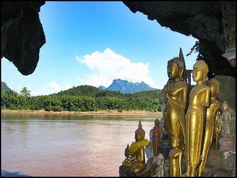 Pak Ou Caves of Laos - Living + Nomads – Travel tips, Guides, News ...