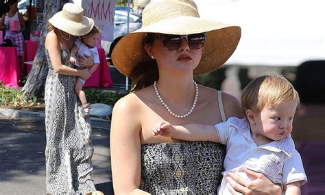 Devon Aoki battles for one-year-old son's attention on visit to the farmers' market | Daily Mail ...