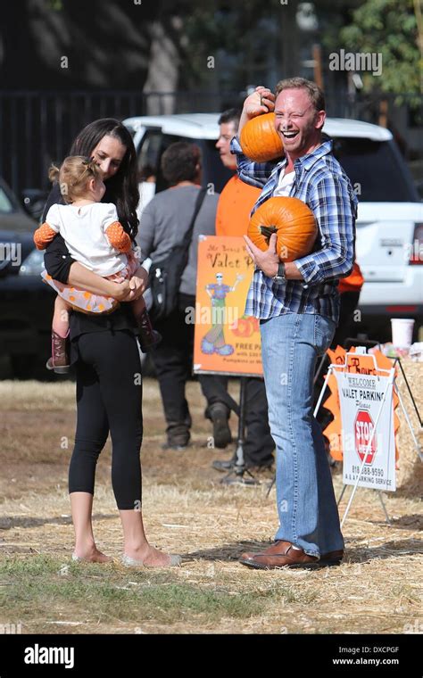 Ian Ziering, Erin Ludwig and Mia Ziering Ian Ziering pretends to put a pumpkin on his head at Mr ...