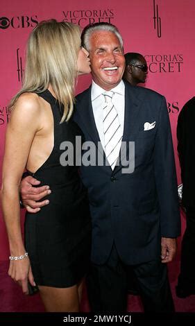 Actor George Hamilton and his wife Kimberly Blackford appear on the Victoria's Secret Fashion ...