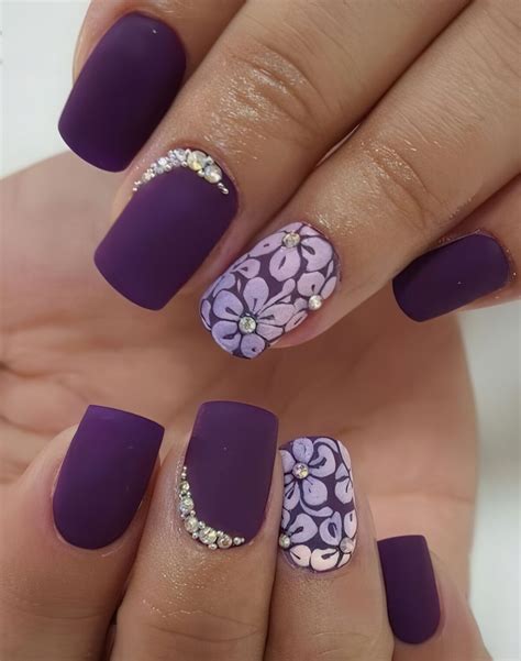 Picture Of matte deep purple nails with rhinestones accents and floral ...