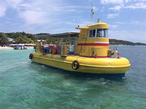 Glass Bottom Boat & Beach Tour – Detour Roatan