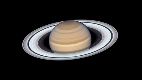 Hubble captures five of Saturn's moons in a single, stunning photograph – Firstpost