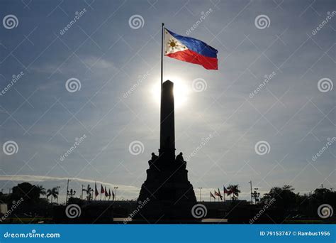 Philippine Flag Being Raised High By A Female Hand Royalty-Free Stock Photography ...