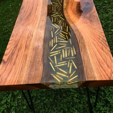 Table design with bullet. #epoxytable #epoxyresin #table #resin #epoxy | Wood resin table, Resin ...