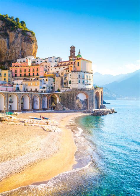 Morning view of Amalfi cityscape on coast line of mediterranean sea ...