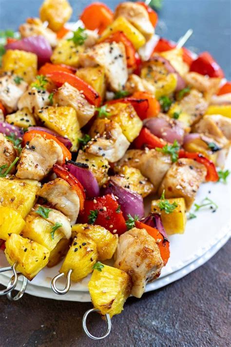 This Pineapple Chicken Kabobs Recipe is a great way to enjoy chicken skewers without even ...