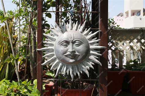 Premium Photo | Sun mask small traditional statue decoration hanging outdoor in jaipur rajasthan ...
