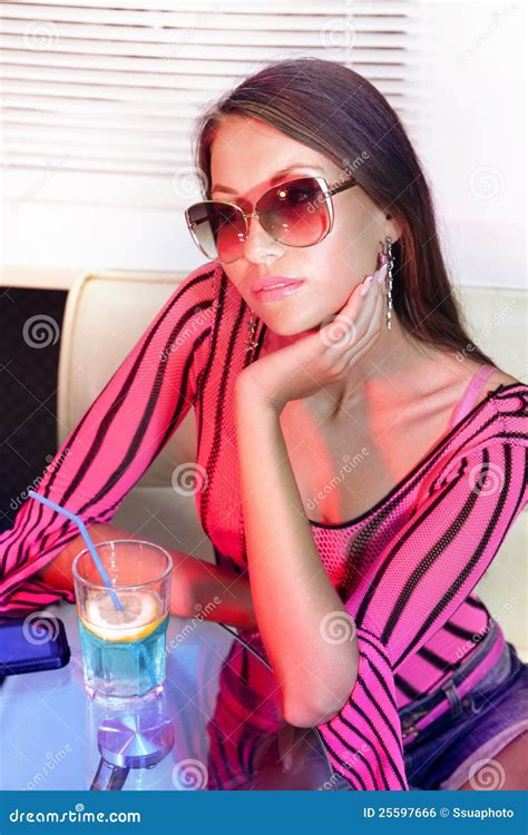 Woman drinking cocktail stock photo. Image of beverage - 25597666