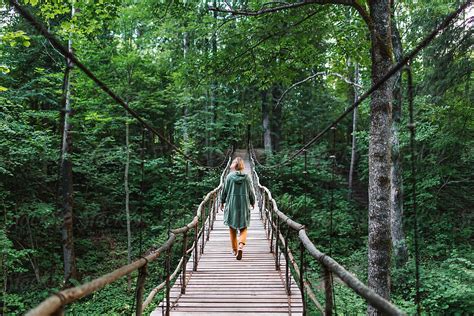 "Woman Walking On A Bridge In Forest" by Stocksy Contributor "Alexander ...