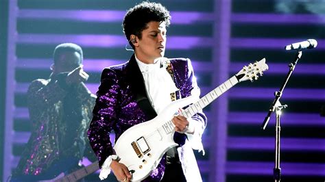 Bruno Mars goes crazy with a Prince-style Cloud guitar at the Grammys ...