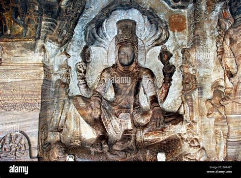 Cave 3 :Statue of Lord Vishnu on naga (snake ), Badami caves, Hampi Stock Photo, Royalty Free ...