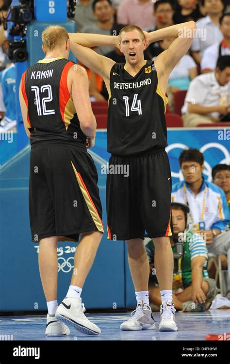 Christopher Kaman and Dirk Nowitzki of Germany during Men's Preliminary Round Group B match at ...