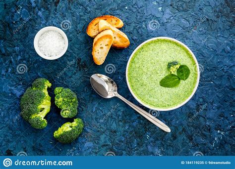 Broccoli Cream Soup, Bread, Spoon on Blue Kitchen Desk Top-down Stock Image - Image of gourmet ...