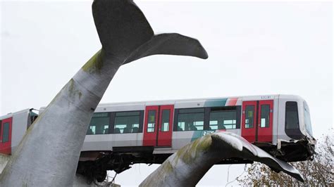 Sculpture of whale's tail saves train from plummeting 30 feet off railway platform - ABC News