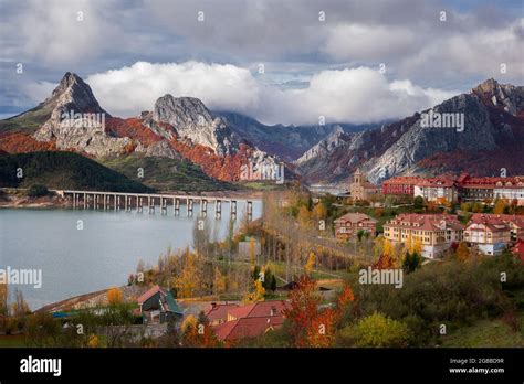 Riano cityscape at sunrise with mountain range landscape during Autumn ...