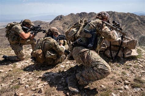 Three Special Forces soldiers return fire during a combat mission in Bagh Dara Valley ...