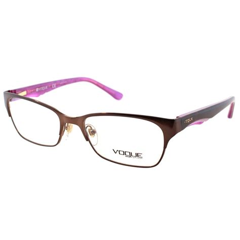 These Vogue Eyewear Women's VO 3918 934 Brushed Brown Metal Rectangle Eyeglasses embody style ...