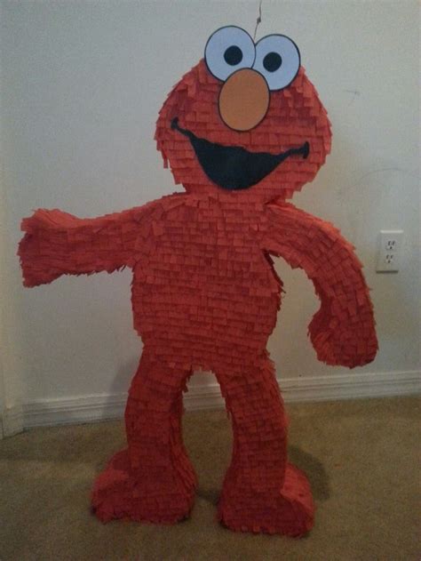 Elmo's piñata | Sesame street birthday party ideas boy, Elmo birthday ...