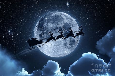 Santa Claus Flying On The Sky Photograph by Omer tolga Dede | Fine Art America