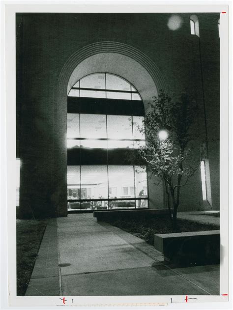 [Window into Willis Library at Night] - The Portal to Texas History