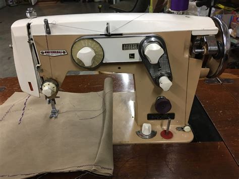 Universal Sewing Zig Zag vintage sewing machine with table - Nex-Tech Classifieds