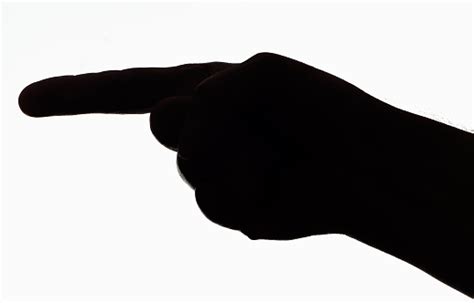 Silhouette Of Human Hand Pointing With Finger Stock Photo - Download Image Now - iStock