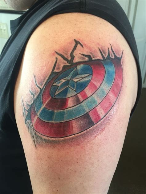 Tattoo of Captain America Shield | Marvel tattoos, Tattoos, Captain america tattoo