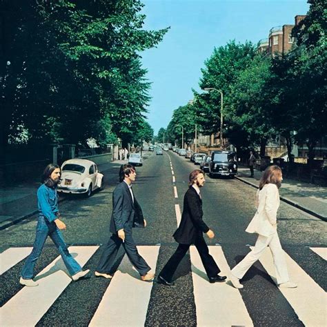 Rare photo of The Beatles walking 'backwards' across Abbey Road to be ...