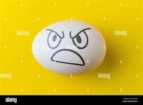 the evil scary angry face emotion painted on the easter egg, halloween ...