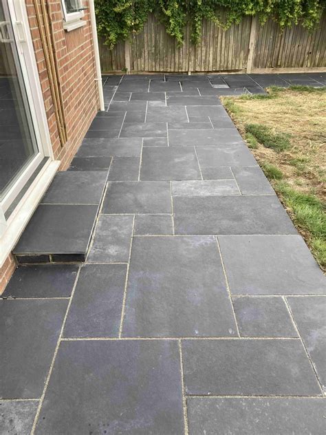 Black Limestone Patio Renovated in South Kent Garden - Stone Cleaning ...