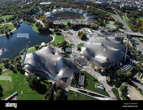 The famous roof of the Munich Olympic stadium designed by Behnisch and Frei Otto Stock Photo - Alamy