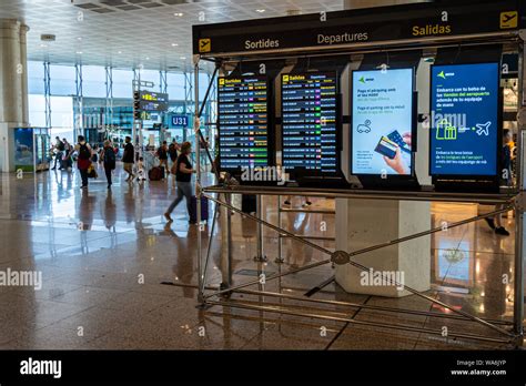 Barcelona, Spain. August 2019: Screens showing flight departures in ...