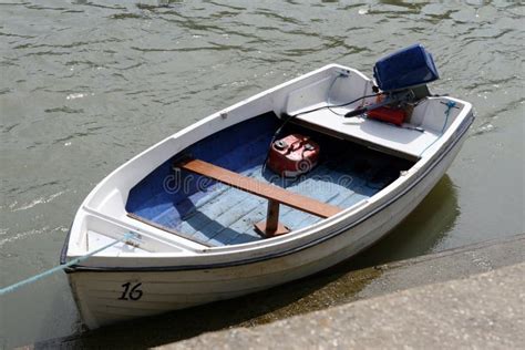 A Small Dinghy Boat On A Tidal Sea River Stock Images - Image: 997284