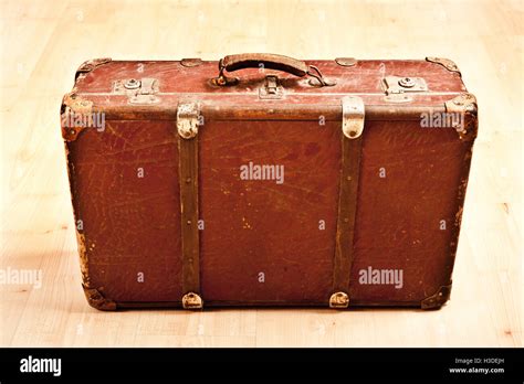 very old damaged luggage Stock Photo - Alamy