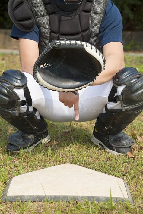 Baseball Catcher Showing Secret Signal Gesture Stock Photo - Image: 40256742