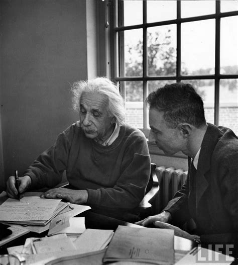 Albert Einstein in discussion with Robert Oppenheimer at the Institute ...