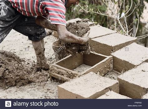 Boy Making Traditional Adobe Mud Bricks To Build His Own House In Stock ...