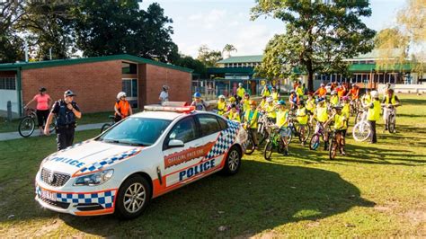 Adopt-a-Cop joins the Edge Hill State School bike ride. - Far North