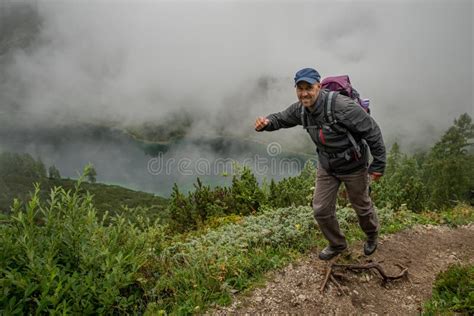 Hikers in the Austrian Alps Walk on Mountain Hiking Trails in the Woods Around the Lakes Stock ...