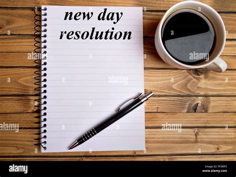 New day resolution word on notepad Stock Photo - Alamy